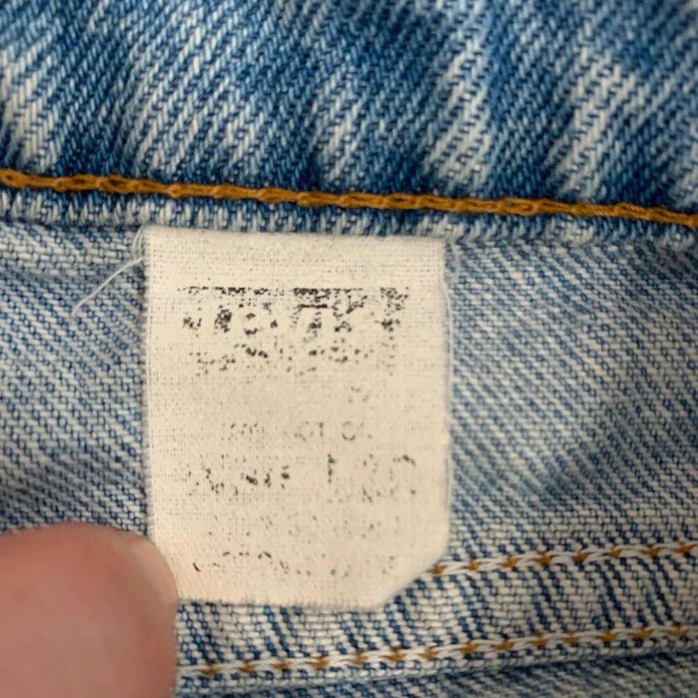 Vintage 80s Levi's 550 orange tab tapered leg denim jeans in light wash - 30x30‎